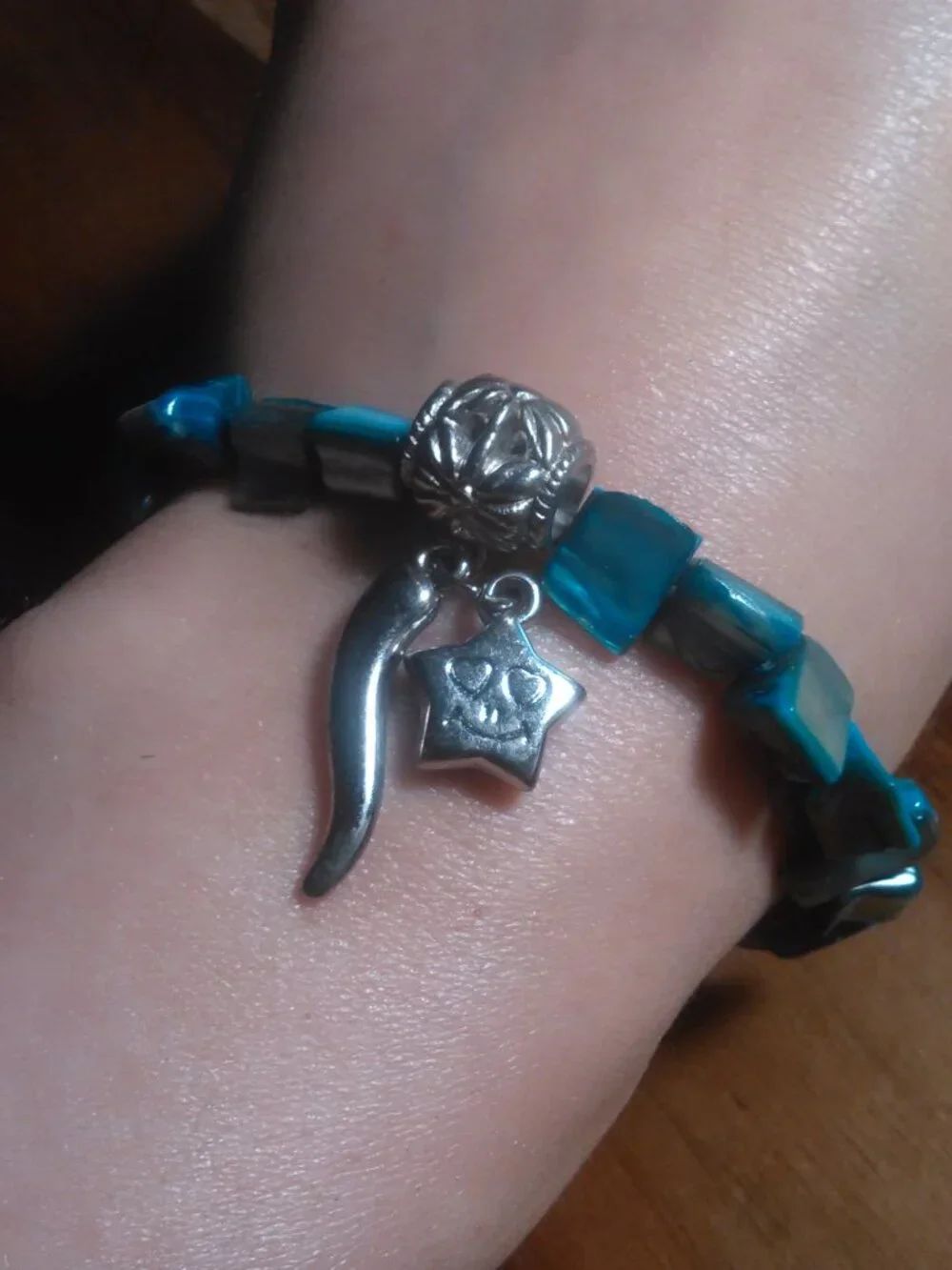 Blue Shell and Silvertone Star Charm Stretch Bracelet